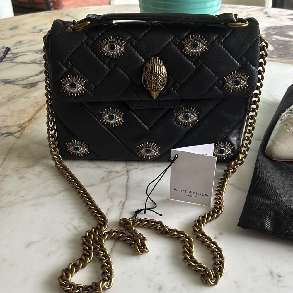 Kurt Geiger Evil Eye Black and Gold Quilted Crossbody Bag includes dust bag